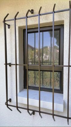 an open window with bars on the outside