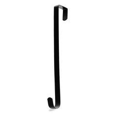 a black metal hook on a white wall