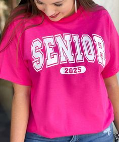 Celebrate your final year of high school in style with our Senior 2025 Graphic Shirt! Featuring the word "Senior" in bold white letters with the year "2025" displayed underneath, this shirt is perfect for showcasing your status as a proud member of the Class of 2025. Available in sizes S-5XL and a variety of color options, you can choose the perfect style to suit your senior year vibe. Whether you're attending school events, hanging out with friends, or prepping for graduation, this shirt is a must-have for every soon-to-be graduate! School Ties, Senior Shirts, Class Of 2025, Monogram Shirts, Beach Birthday, Black Friday Christmas, Graduation Shirts, School Events, White Letters