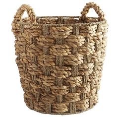 a large woven basket with handles on the front and sides, made from natural materials