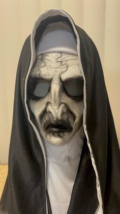 This latex mask is inspired by the infamous Valak will frighten anyone this Halloween! This is a handcrafted mask sculpted by me, and provides an eerie resemblance of a Nun showcased in modern horror.  How was this piece made? I sculpted the likeness of this horror icon in WED clay, and created a plaster mold. I cast latex in the mold and pulled out a skin which was then painstakingly painted to match that of movie quality.  This mask has an elastic band that will conform to most head shapes and sizes. The wide eye holes alow for incredible visibility! you can blend the mask to your face if you use black face paint around your eyes!  Each one is handmade so there may be slight differences!  *THESE MASKS ARE ONLY THE LATEX HALF MASK... headdress not included Horror Cosplay, Black Face Paint, Mask Horror, Art Examples, Horror Masks, Half Mask, Horror Icons, Cosplay Halloween, Head Shapes