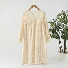 Experience elegance and comfort in our pastoral cotton nightgown, featuring double gauze layers, intricate lace, and bow details, perfect for stylish relaxation. Long Sleeve Lace Sleepwear For Loungewear, Feminine Delicate Lace Loungewear Dress, Long Sleeve Lace Sleepwear For Lounge, Feminine Sleepwear With Lace Trim, Feminine Cream Sleepwear For Bedtime, Feminine Delicate Lace Nightgown For Loungewear, Feminine Long Sleeve Cotton Nightgown, Lace Nightgown With Lace Trim For Sleep, Feminine Long Sleeve Lace Sleepwear