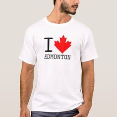 a man wearing a white shirt with the canadian flag on it and i love edmonton