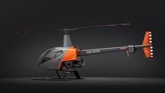 an orange and gray helicopter on a black background with the words airbos above it