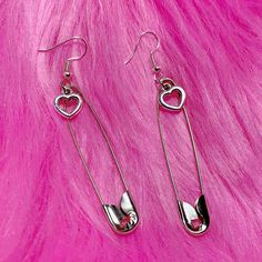 Take a fashionable risk with our Safety Pin Heart Earrings! These edgy earrings feature a heart charm attached to a safety pin, adding a cute and alternative touch to any outfit. Dare to be different and rock these unique earrings! Description: Item Type: EarringsEarring Type: Drop EarringsMetal Type: Iron AlloyOrigin: CNShape\Pattern: HeartMaterial: Metal Safety Pin Heart, Egirl Jewelry, Gothic Harajuku, Earrings Punk, Edgy Earrings, Punk Aesthetic, Y2k Accessories, Dare To Be Different, Macrame Earrings