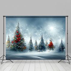 an image of a christmas scene with trees in the snow