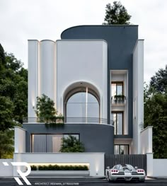 two cars are parked in front of a modern house