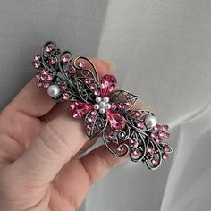 Unique and stylish, this floral pink rose crystal hair clip would make the perfect bridal hair accessory for a wedding or any other formal event.  It's a popular choice for wearing to proms and renaissance fairs, especially!  The fancy hair barrette possesses an elven charm with a playful design of antique silver toned leaves and flowers and several crisp pink rose colored Swarovski crystals. With the allure of diamonds, Swarovski Crystals are made in Austria and are the highest quality lead free glass-cut crystals on the market, with extra facets and gold foiling for outstanding brilliance and sparkle. These are perfect hair barrettes for thick hair!  The sturdy hair clip bar can easily accommodate 2" or more. For finer hair, I suggest you first wrap it with an elastic hair tie to add thi Crystal Hair Clip, Fancy Hair, Crystal Hair Clips, Rose Crystal, Fancy Hairstyles, Elastic Hair Ties, Crystal Hair, Bridal Hair Accessories, Hair Barrettes