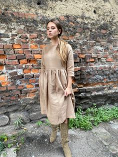 "Spring dress, Write the selected color in the message Handmade nut brown linen dress with 3/4 long sleeves and 2 pockets , perfect for casual wear and suitable for any occasion in any season Details: - 100% natural linen produced in Europe ; - medium weight (180 gram per square meter); - color: nut brown, could be any from our colors catalog (color samples at the photo); Made to order, approximately a few days, If you have any questions please message me and I will be glad to answer. Size guide Casual Brown Linen Dress For Fall, Beige Linen Dress With Relaxed Fit For Fall, Brown Linen Long Sleeve Dress, Neutral Long Sleeve Linen Dress, Brown Linen Dresses With Pockets, Brown Linen Fall Dress, Casual Long Sleeve Flax Dress, Casual Long Sleeve Brown Linen Dress, Casual Brown Long Sleeve Linen Dress