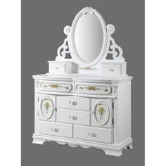 an ornate white dresser with mirror and drawers