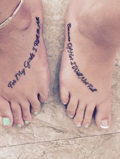 two people with matching tattoos on their feet