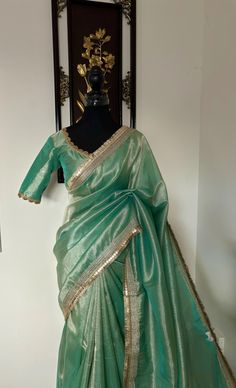 Pestal color Beautiful Tissue Banarasi saree with beautifully done lace work boarder and ready to wear blouse with 32 to 46 fitting  Saree is ready with fall pico and tassels . #readytowearesarees #suhasinihandstock #readytowearblouses #readytoshiptousa❤️✈️ #readytoshipcanada❤️✈️ #cockrailsofinstagram #weddinginspiration #partywearsarees😇 #suhasinihandstock Green Sharara With Embroidered Border For Navratri, Designer Green Sharara With Embroidered Border, Designer Wear Green Sharara With Embroidered Border, Green Sharara With Embroidered Border For Diwali, Designer Pista Green Dupatta With Embroidered Border, Pista Green Chanderi Sharara With Embroidered Border, Festive Pre-draped Saree In Tissue Silk With Resham Embroidery, Pista Green Sharara With Embroidered Border, Festive Pre-draped Tissue Silk Saree With Resham Embroidery