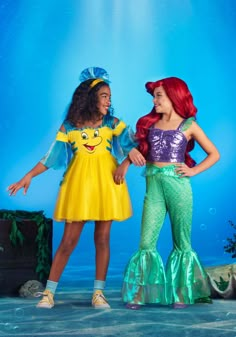 Bright Style
There's nothing quite as fun as wearing bright colors. And there are no other characters quite like Disney's Flounder when it comes to shining scales. His glowing yellow and shining blue fins can make practically anyone smile in a single swish of a fin. If you and yours want to smile, this officially licensed Disney Flounder costume dress is the perfect answer!
Design & Details
This Made By Us design is inspired by the ultimate companion from Disney's The Little Mermaid. The dress h The Little Mermaid Costume Women, Cool Kids Halloween Costumes, Ariel And Flounder Costume, Little Mermaid Group Costume, Flounder Costume Diy, Disney Trio Costumes, Little Mermaid Family Costume, Girl Halloween Costumes For Kids, Kid Halloween Costumes