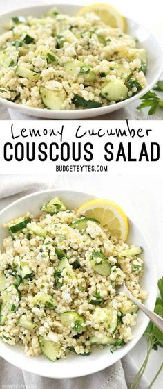 two bowls filled with cucumber salad on top of a white table next to lemon wedges