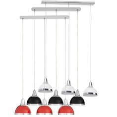 five lights hanging from the ceiling with red and black shades on them, including one light fixture