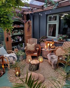 an outdoor area with chairs, tables and candles