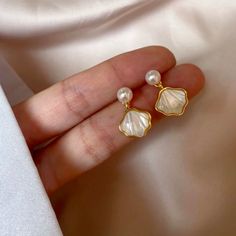 50 Gifts For Your Friend Who Belongs in a Nancy Meyers Movie | The Everygirl Pearl Clam, Classy Jewelry, Clam Shell, Shell Earrings, Girly Jewelry, Jewelry Inspo, Dream Jewelry