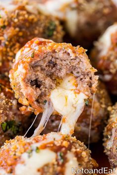 the meatballs are stuffed with cheese and herbs