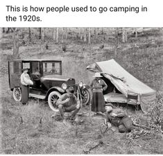 an old black and white photo of people camping in the 1920's with a truck