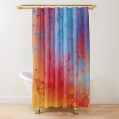 a shower curtain with colorful paint splattered on it