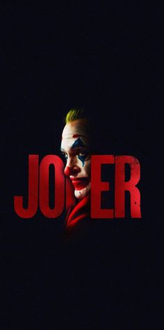 the joker movie poster with his face painted in red and blue, on a black background