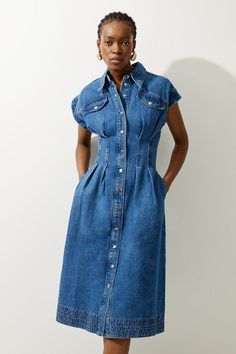 Feel Confident In Our Midi Dress, Made In Classic Denim Fabric, Featuring A Darted Waistline That Cinches The Silhouette, A Formal, Flowing Skirt, And A Shirt Style Bodice. Style It With Court Heels Or Ankle Boots For A Look Perfect For Office Days, Then Wear It With Heeled Boots Or Stilettos For An Evening Look. Denim Button Through Darted Waist Midaxi Shirt Dress High Quality Denim Fabric Flattering Fit And Flare Silhouette Formal Collar Accent Cinched, Darted Waist Button Front Fastenings Sho Cheap Medium Wash Denim Shirt Dress, Affordable Washed Sleeveless Denim Dress, Cheap Collared Denim Dress For Work, Cheap Fitted Dark Wash Denim Dress, Cheap Medium Wash Denim Dress For Brunch, Cheap Spring Denim Dress With Buttoned Pockets, Cheap Women's Denim Midi Dress, Chic Long Sleeve Cheap Denim Dress, Cheap Denim Blue Ruffled Dresses