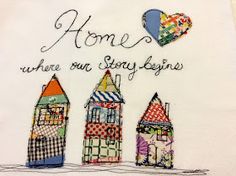 a white towel with some houses on it and a heart in the middle that says home, where our story begins