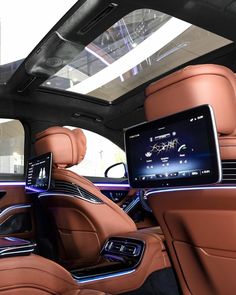 the interior of a car with an entertainment system