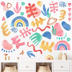 a colorful wall mural in a child's room