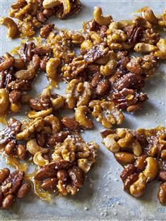 nuts are arranged on a baking sheet ready to be eaten