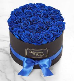 a black box with blue roses in it