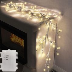 a fireplace with some lights on it