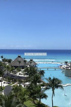 an aerial view of the beach and pool at cancuni, quintaana resort