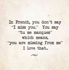 an old typewriter with the words in french, you don't say i miss you