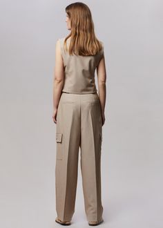 Color: Taupe Melange Traditional suiting fabric with light stretch Tailored cargo style Pleat front detail Welt hip pockets Enlarged cargo pockets at the leg Unlined 77% Polyester 18% Rayon 5% Spandex Dry Clean By The Frankie Shop. Imported Product Measurements: S- 26" Waist, 42" Hip, 13" Rise, 27" Inseam M- 28" Waist, 44" Hip, 13.25" Rise, 27.5" Inseam L- 30" Waist, 46" Hip, 13.5" Rise, 28" Inseam XL- 32" Waist, 48" Hip, 14" Rise, 28.5" Inseam Model is 175cm/5'9" wearing size S Denim Suit, Suiting Fabric, The Frankie Shop, Frankie Shop, Paris Woman, Sporty And Rich, Matches Fashion, Bra Women, Fashion Advice