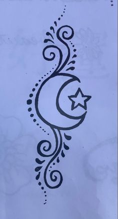 an artistic tattoo design with a crescent and star