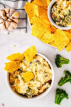 broccoli and cheese dip with tortilla chips in bowls on the side