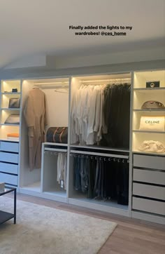 the closet is full of clothes and other items