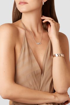 Messika's 'Move' collection is a favorite of Gigi Hadid - in fact, the model is such a big fan, she even collaborated with the brand to create her own version of the signature lineup. Recognized by its bezel-set diamonds that slide freely in a slender pavé-encrusted setting, this necklace is handcrafted from 18-karat white gold and stippled with four more shimmering stones along its delicate chain.  Each Messika piece comes with a two-year warranty, which is activated 28 days after purchase. To… Mens Accessories Necklace, Best Necklace, Jacquemus Dress, Necklace Guide, White Gold Diamond Necklace, Boyfriend Necklace, Mix Jewelry, Necklace Length Guide, Druzy Necklace