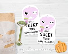 two tags that say, let's get sheet faced happy halloween