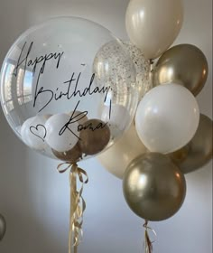 a bunch of balloons that say happy birthday kora and have some writing on them