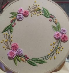 the embroidery is done and ready to be sewn on with it's flowers