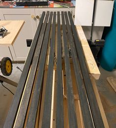 the slats are being assembled and ready to be put in place for woodworking