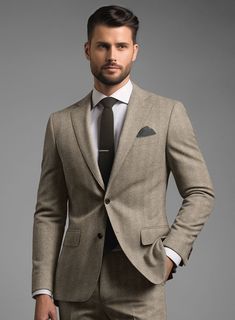 Experience the refined charm and pleasure of dressing in our exquisite Italian Light Brown Herringbone Flannel Suit, tailored to be as exceptional as you are. Made from premium-grade wool, this suit boasts a light brown shade that exudes warmth and approachability, while its herringbone design elevates you to the epitome of elegance with a subtle touch of contemporary flair. Whether you're attending a formal event, a business meeting, or a special celebration, this suit is your ultimate go-to choice for a distinguished and polished look.  Look features a 2 button jacket with notch lapels,  horn brown  buttons, single vent, three cuff buttons and two welted back pockets on trousers. 
  Click 'Customize Now' to modify the look if needed.     
  
Lining: Viscose. Blue Tweed Jacket, Grey Tweed Suit, Tweed Shirt, Peaky Blinders Suit, Flannel Suit, Herringbone Design, Herringbone Tweed, Brown Shade, Green Suit