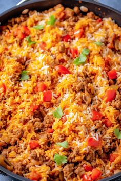 mexican rice and ground beef in a skillet ready to be eaten for lunch or dinner