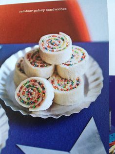 an image of some kind of cake roll on a plate with sprinkles