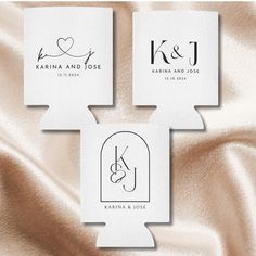 two white paper tags with the initials k and j on them, sitting next to each other