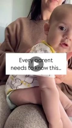 a woman holding a baby in her lap with the caption every parent needs to know this