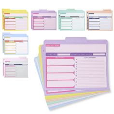 five different colored binders with notes attached to them