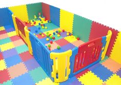 an indoor play area with colorful foam tiles